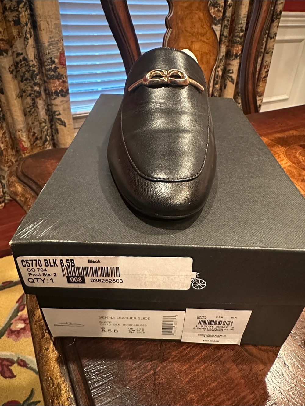 Coach Black Leather Slip-On Loafer with Gold Accent